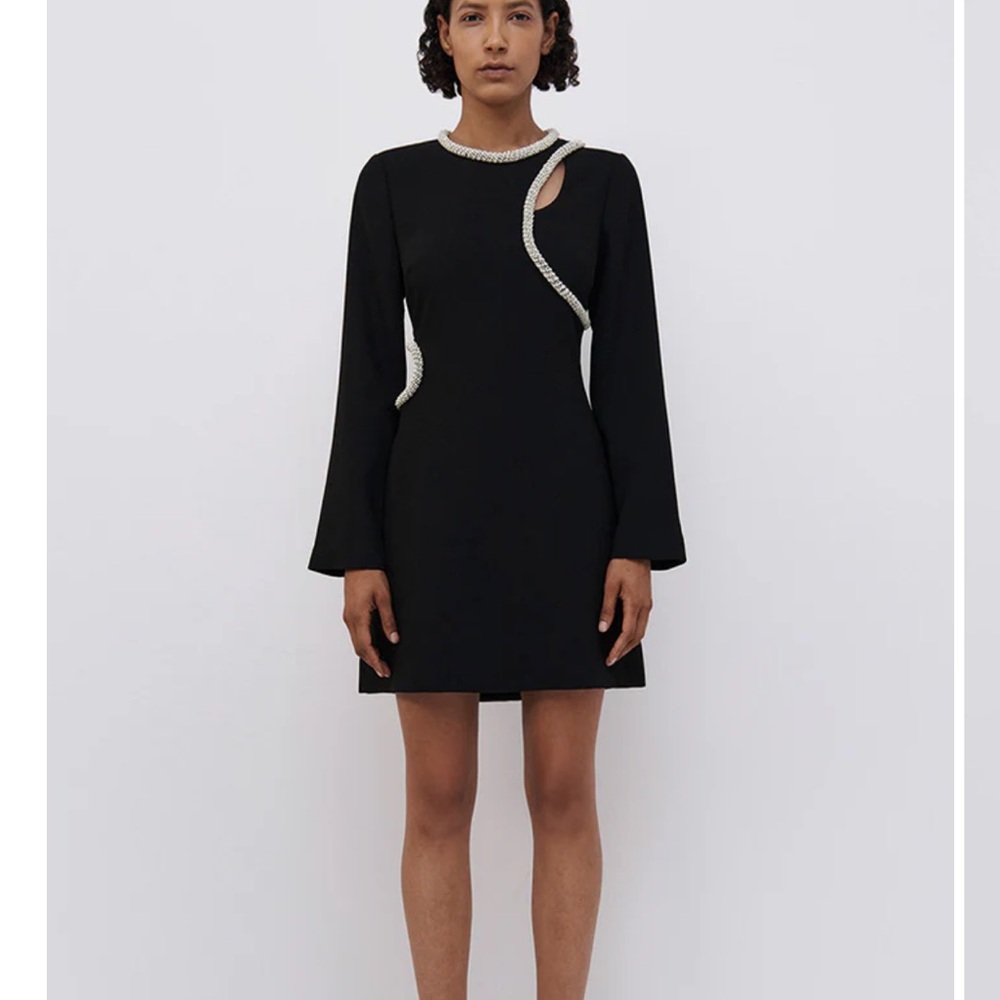 Elegant Black Dress with Unique Cutout Design